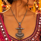 Model wearing Ruby Axis Pendant in 925 sterling silver | Harsh Jewellers